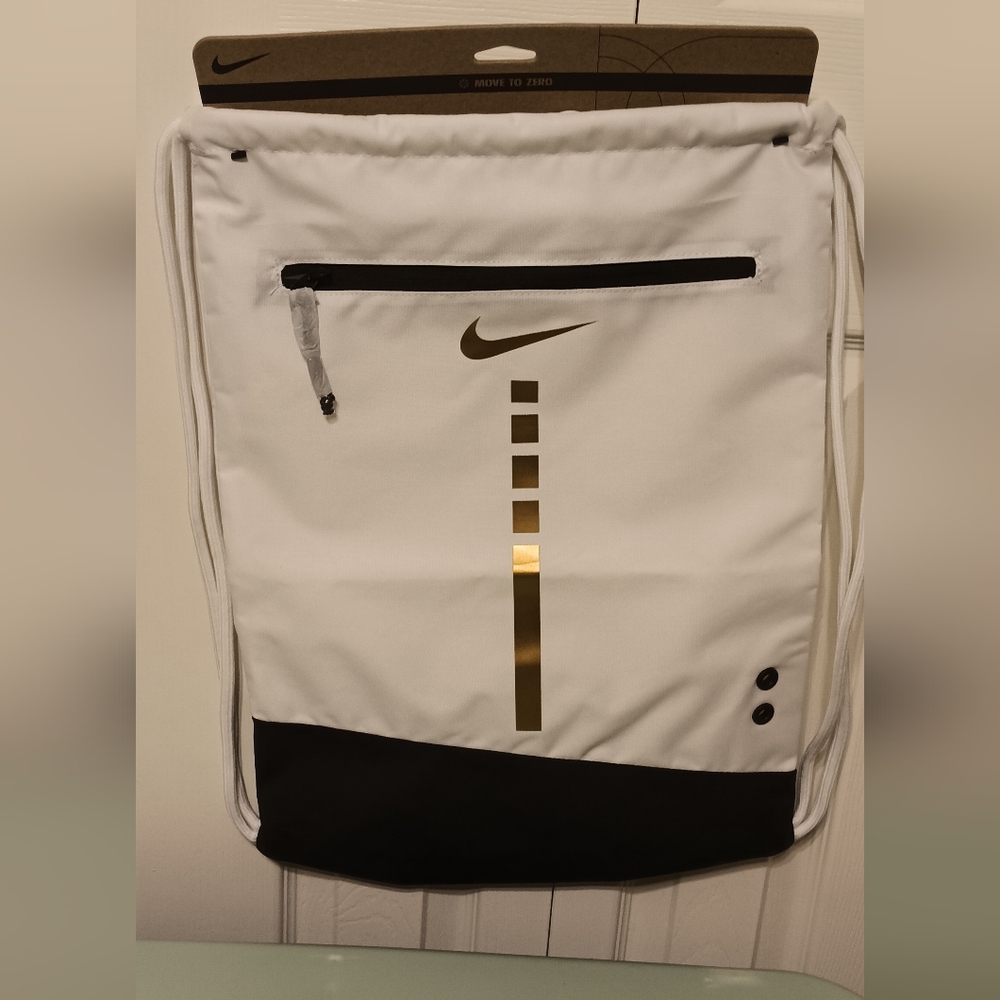 Nike White and Black Drawstring Backpack with Gold Accents